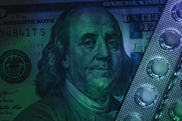 Poster - Pills or drugs and dollars cash money in a package under neon light on a dark background pattern for design..