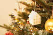 © brillianata - Christmas tree decoration. Christmas tree toy - house. Concept of a children room in the new year style