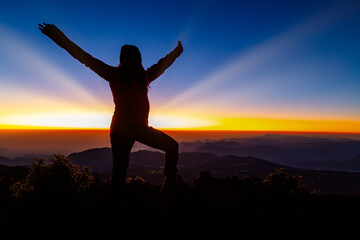 Beautiful shot of a female posing in the Pico de Orizaba Volcano in Mexico