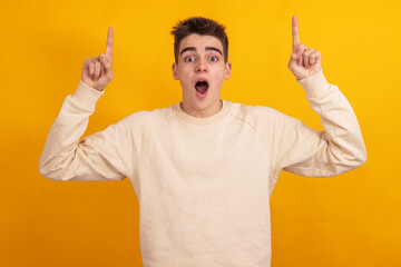 Poster - teenager boy pointing isolated on background