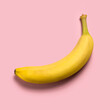 © Tetra Images/Tetra Images - Ripe banana on pink background