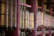 © Luis Gomez/ADDICTIVE STOCK - Old stone Tibetan rolls with sacred mantra consisting of sanskrit inscription near temple