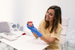 © Dani Navarro/ADDICTIVE STOCK - Female dentist with cosmetic braces on her hands