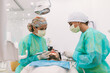 © Dani Navarro/ADDICTIVE STOCK - Young Female patient with open mouth examining dental inspection