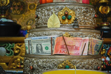 Traditional Religious Figure Of Buddha Placed In Oriental Temple For Religious Prayers And Rituals