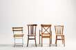 © Txema Gerardo/ADDICTIVE STOCK - Four classical wooden chairs against white background