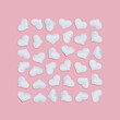 © yrabota - White hearts inscribed in square shape on pink fon. Holiday background for Valentines Day. Love concept. Plain colored. Minimal style.