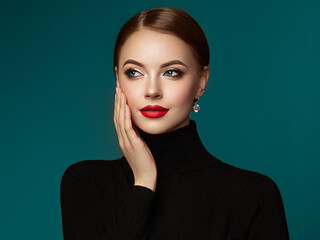 Wall Mural - beautiful young woman with clean fresh skin. perfect makeup. beauty fashion. red lips. cosmetic eyes