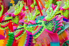 Group Of Colorful Dragon Plastic And Paper Toy For Chinese New Year Happy And Goodluck