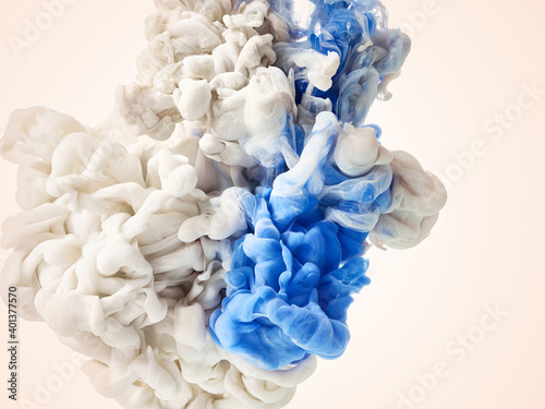 Tela Ink drop in water over beige background