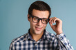 © Drobot Dean - Portrait of happy smiling man isolated on blue