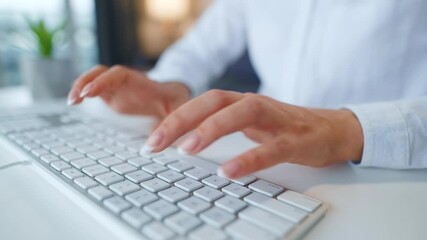 Female hands typing on a computer keyboard. Concept of remote work.