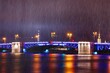 Night view of the Palace bridge in St. Petersburg in the rain