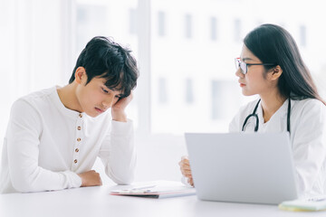 asian female doctor is checking on the patient's health