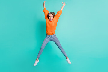 Sticker - Full body photo of young excited girl happy positive smile have fun jump up isolated over turquoise color background