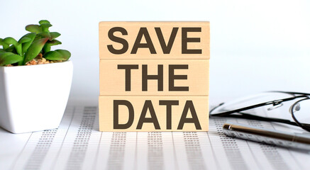 Poster - SAVE THE DATA text on the wooden cubes on the chart