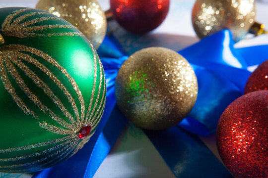 Happy Christmas. Multicolored balls on the blue white gift