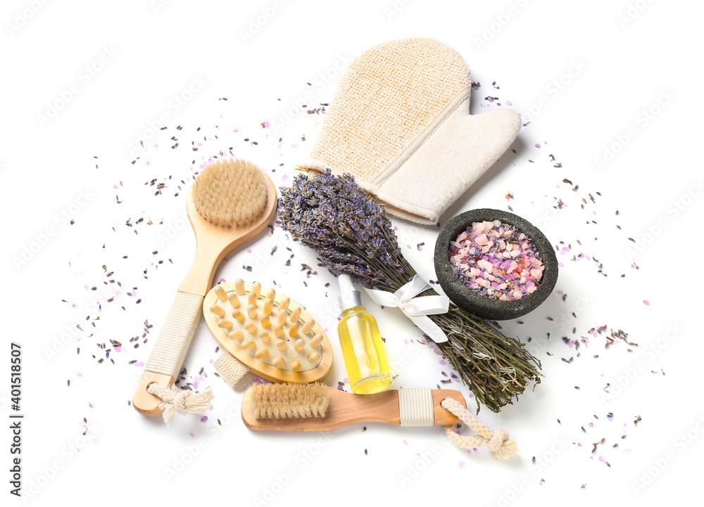 Composition with lavender bouquet and bath products on white background