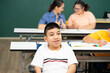 © ake - Asian Autism children with disability kid on wheelchair in special classroom with teacher.