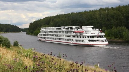 Wall Mural - Moscow Region, Russia – 07 06 2019: Russian tourist big passenger ship Viking Helgi liner floats on Moscow Canal water at Sunny summer day, River Cruises travel