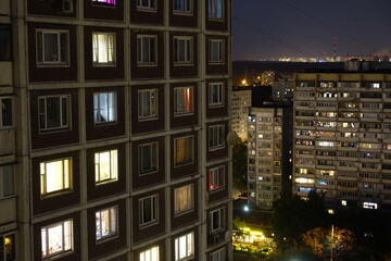 Light in the houses of the sleeping area at night. Moscow, Russia.