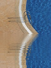Photograph Of Swimming Pool Area Transformed Into Variations Of Straight And Curved Abstract Patterns And Designs