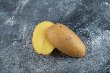 Wall Mural - Close up photo of half or whole potatoes