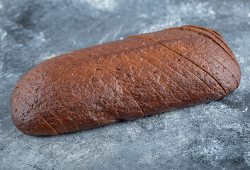 Wall Mural - Homemade Organic Pumpernickel Rye Bread Cut into Slices