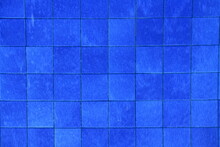 A Wall With Blue Tiles