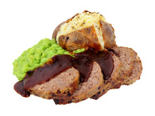 Baked Beef And Pork Meatloaf With A Jacket Potato And Gravy Meal Isolated On A White Background