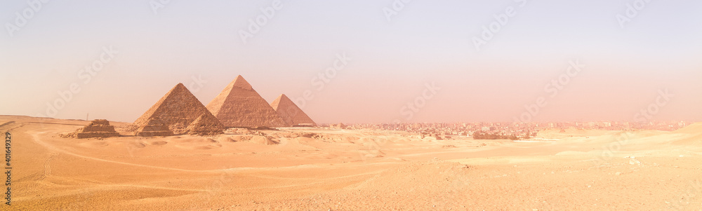 The pyramids of Giza, Cairo, Egypt. Oldest of the Seven Wonders of the Ancient World, and the only one to remain largely intact. - obrazy, fototapety, plakaty 