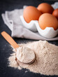 © Narsil - fresh natural buckwheat flour on a dark stone background culinary concept