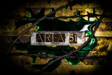 Area 51 Text Message Over Green Fluid On Textured Grunge Copper And Vintage Gold Background With Barbed Wire