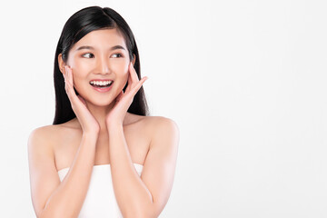 beautiful young asian woman with clean fresh skin, on pink background, face care, facial treatment. 