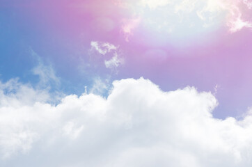 a beautiful shot of the blue sky, white clouds and falling sun rays
