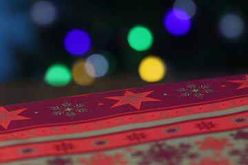 Poster - A shot of Christmas gift on bokeh background