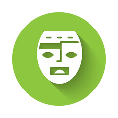 Poster - White Mexican mayan or aztec mask icon isolated with long shadow. Green circle button. Vector.