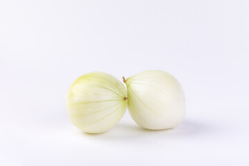 Wall Mural - Two fresh onions isolated on a white background