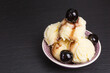 fresh amarena ice cream scoops with cherry
