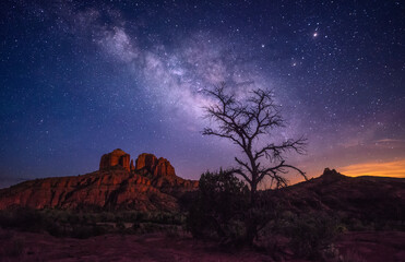 Wall Mural - A beautiful shot of the Cathedral Rock under the stars, Milky Way on the night starry sky