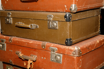 Poster - stack of old retro suitcases close up