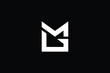 MG logo letter design on luxury background. GM logo monogram initials letter concept. MG icon logo design. GM elegant and Professional letter icon design on black background. M G GM MG