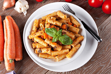 Poster - Macaroni Bolognese on a plate. Typical Italian dish.