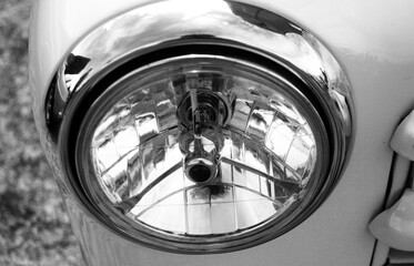 Close-up of Vintage Headlight in Black and White