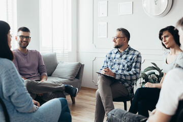 Wall Mural - Group meeting with counselor for people trying to gain life balance