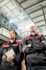 Aufkleber - Contemporary confident male and female workers of large modern factory