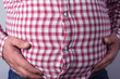 overweight man. Symbolic photo for a beer belly