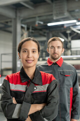 Poster - Young successful female leader of workteam keeping her arms crossed by chest