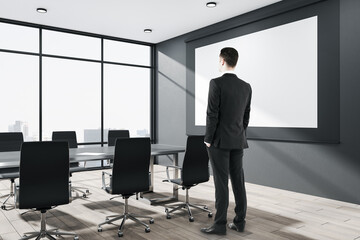 Aufkleber - Businessman standing in conference room