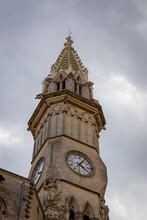 A Vertical Shot Of The Clocktower Of Manacor Cathedral In Mallorca, Spain